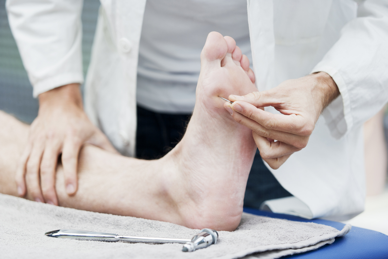 doctor treating diatbetic neuropathy