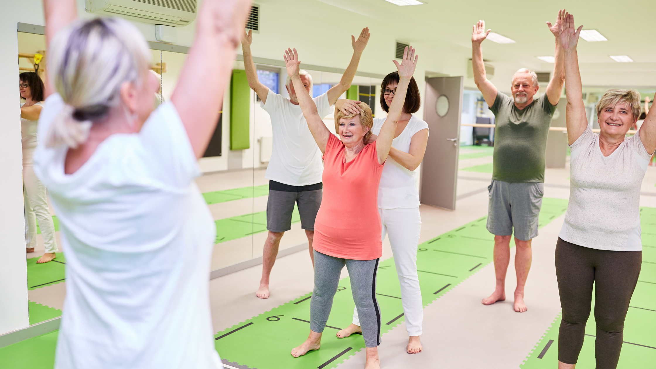 group of older people exercising to reduce neuropathic pain
